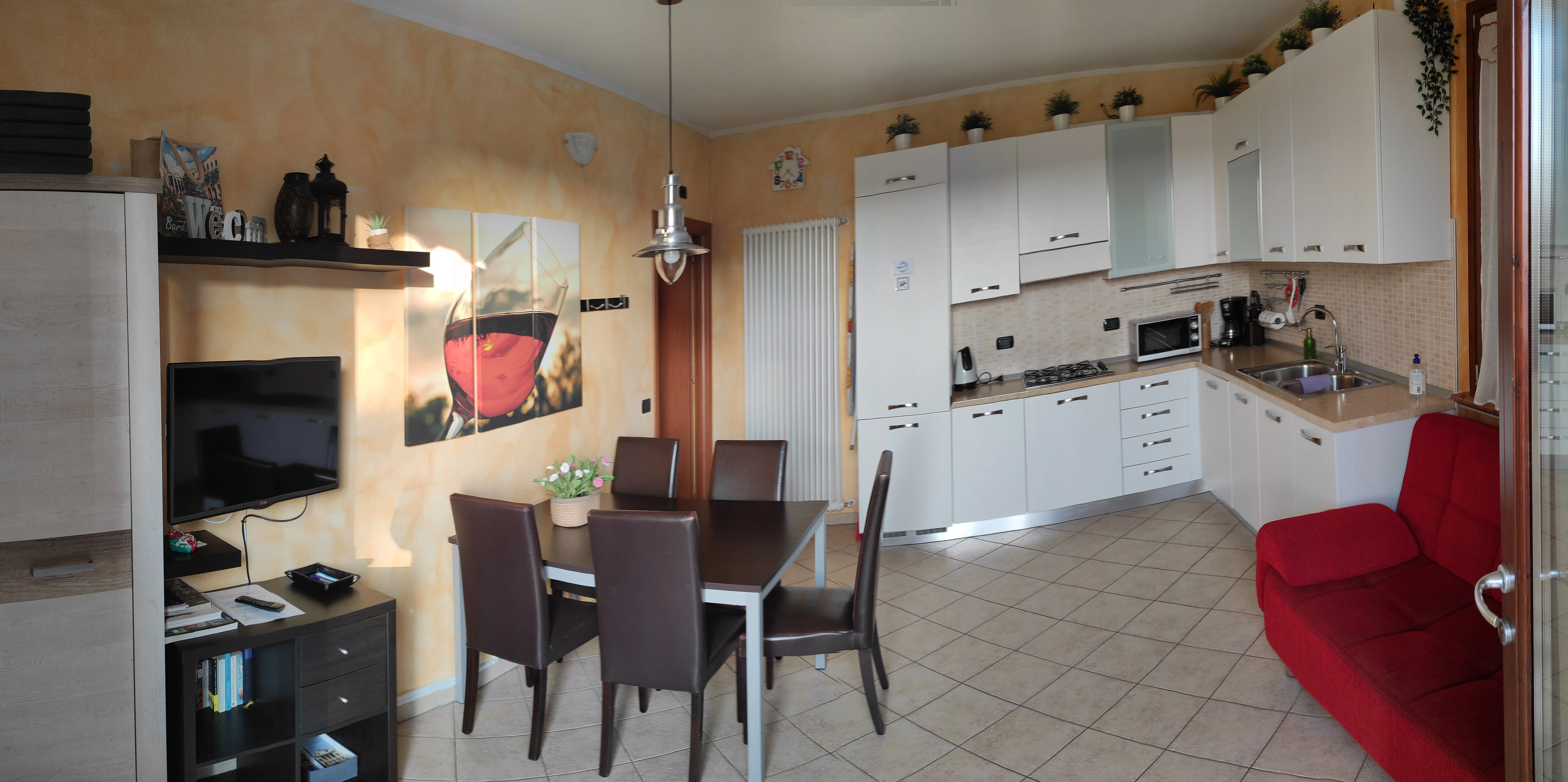 Soggiorno e cucina attrezzata - BedBardolino Bardolino
